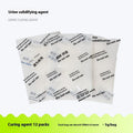Disposable emergency urine bag kit with black degradable bags and curing agent sachets.