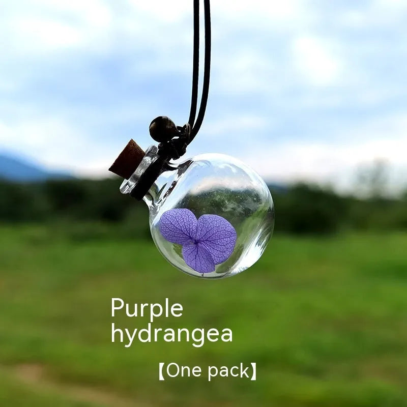 Glass car perfume pendant with preserved flowers in selected colour and diameter
