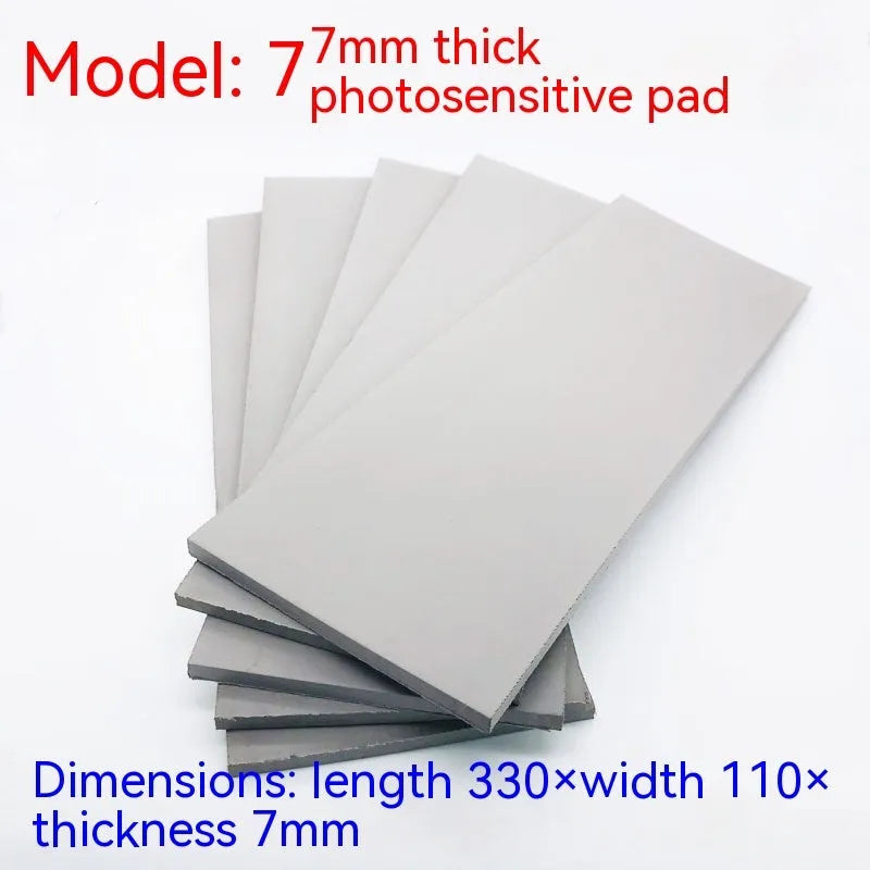 Black and grey plastic light-sensitive mat for seal pottery and calligraphy, showing 330mm by 110mm dimensions.