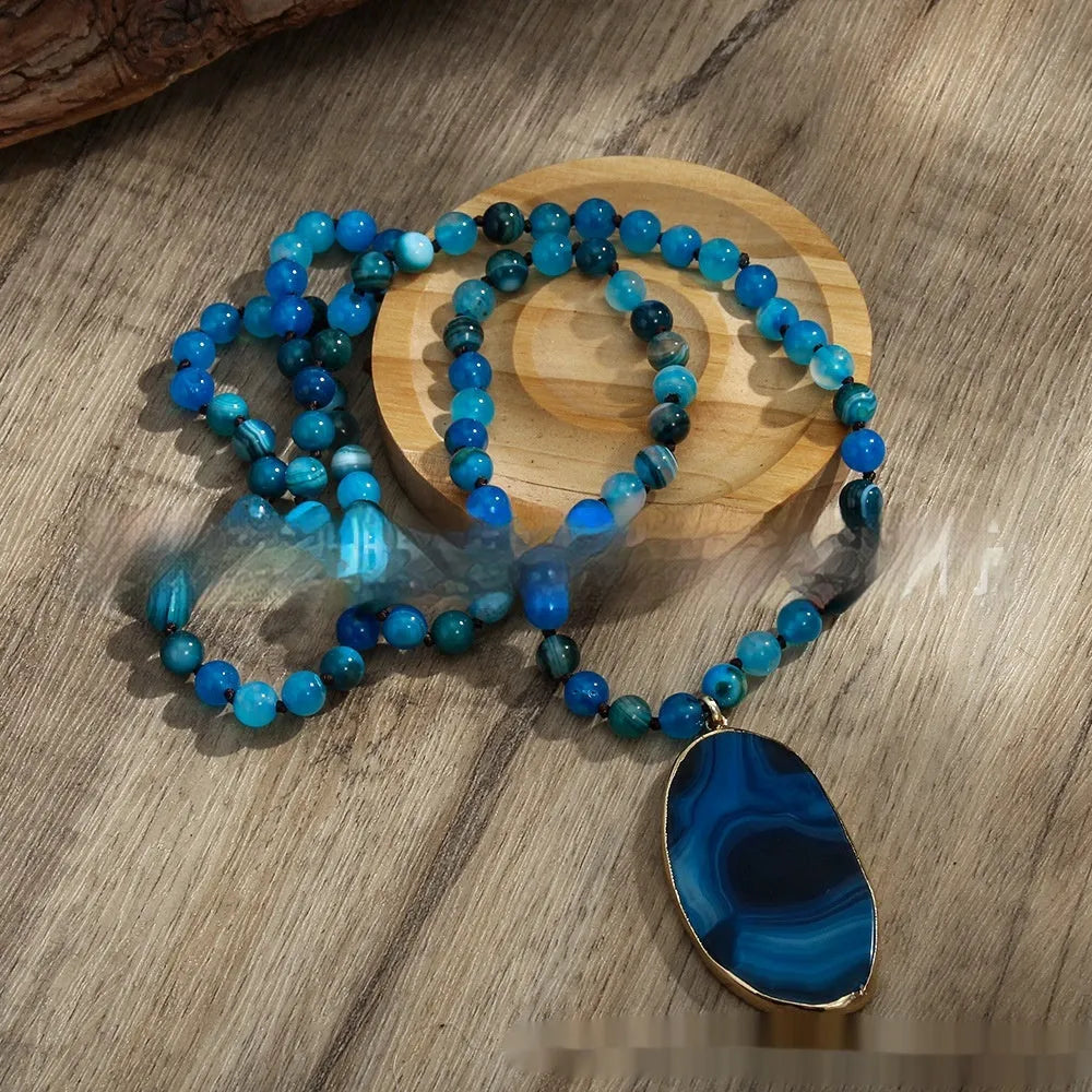 Bohemian handmade necklace with natural stone beads in brown, irregular agate pendant and knotted chain