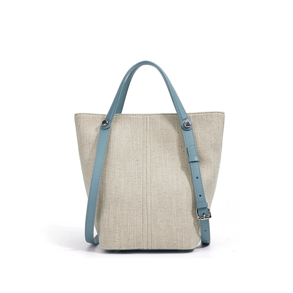 Genuine leather shoulder bag in Linen Black with contrast stitching and open pocket