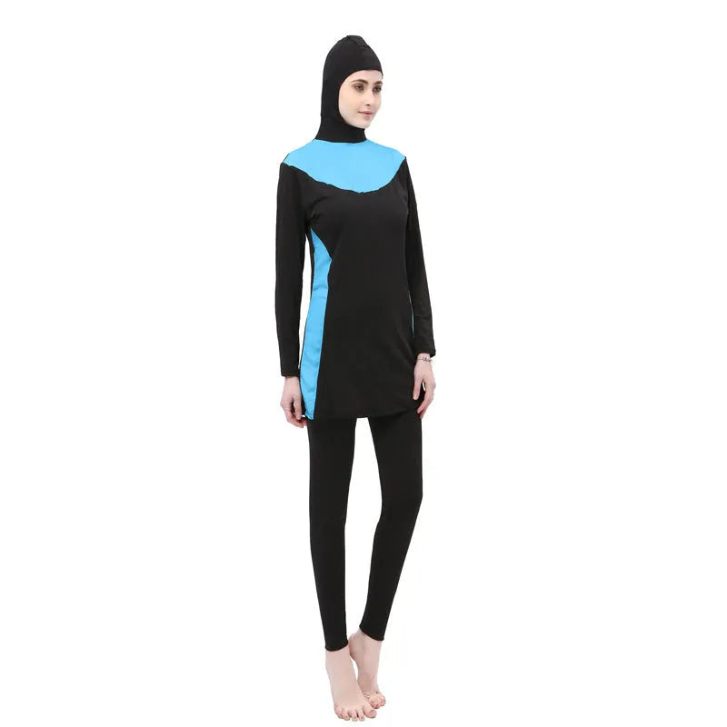 Black long sleeve hooded women's swimsuit top and trousers set for swimming.