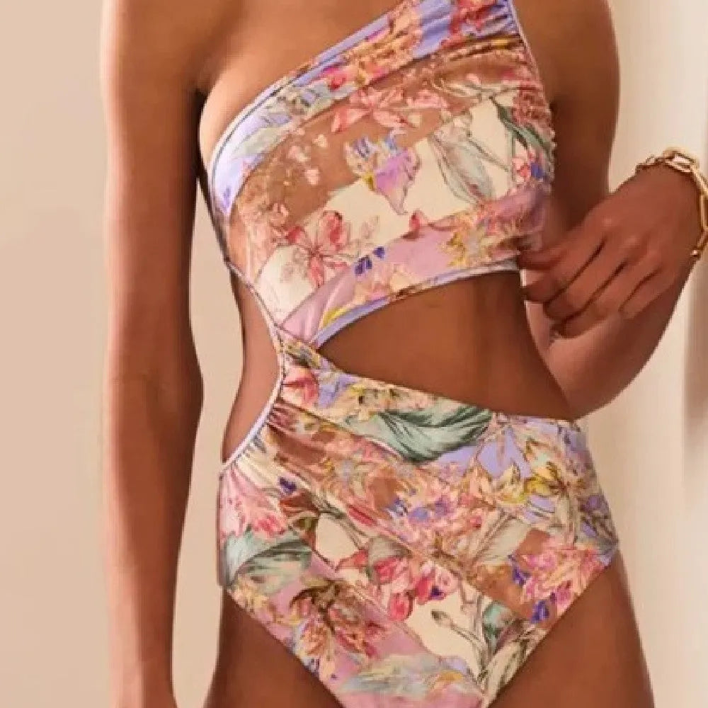 Women's rose gold pattern swimsuit made from polyester fabric available in multiple sizes