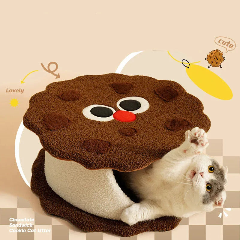 Khaki coloured enclosed cat house with circular entrance, nest-shaped like a sandwich cookie