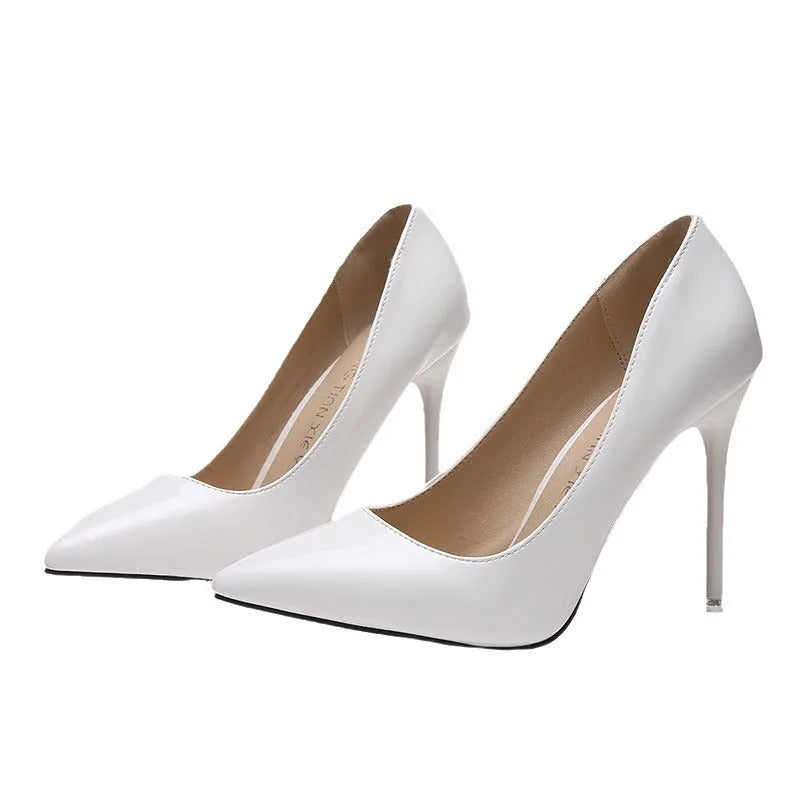 Women's pointed toe stiletto high heel pumps in apricot colour with buckle detail