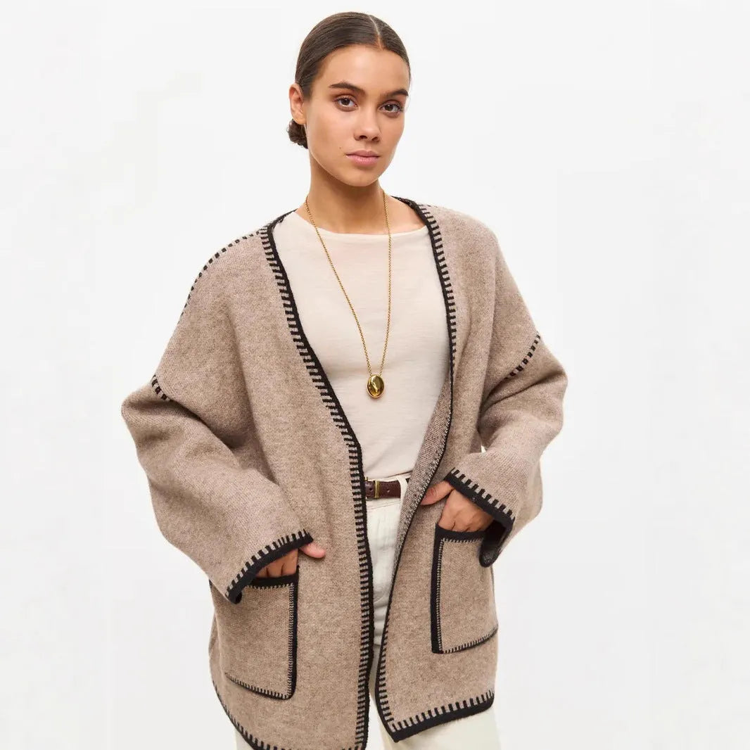 Loose fit knitted cardigan coat in imitation cashmere fabric showing front cardigan styling and long sleeves