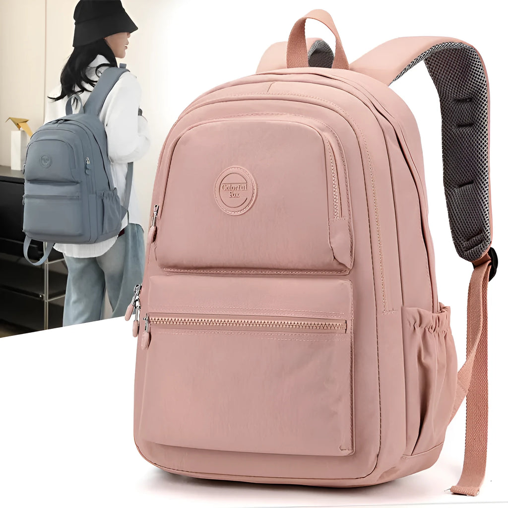 Women's large nylon travel backpack in celestite green showing front three-dimensional pocket and urban style.