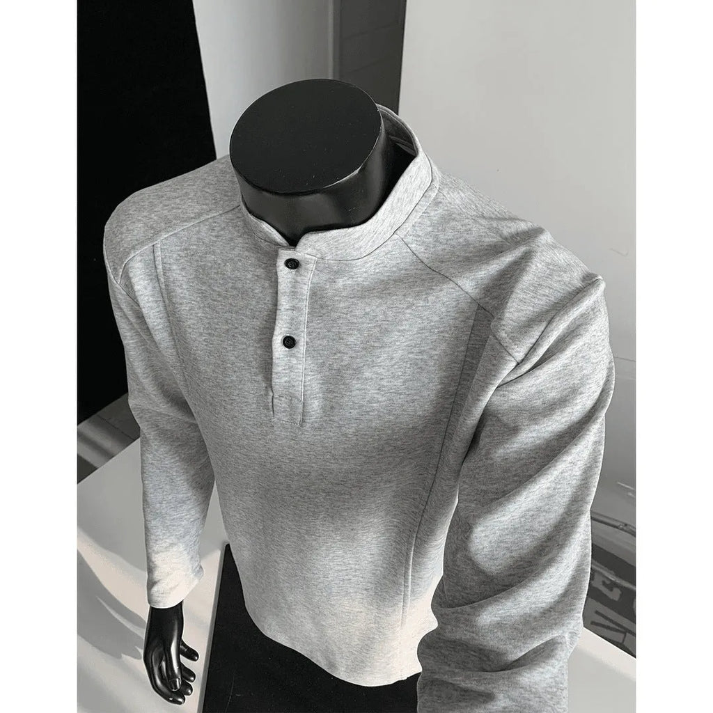 Men's grey asymmetric stand-up collar long sleeve polo shirt on a hanger.