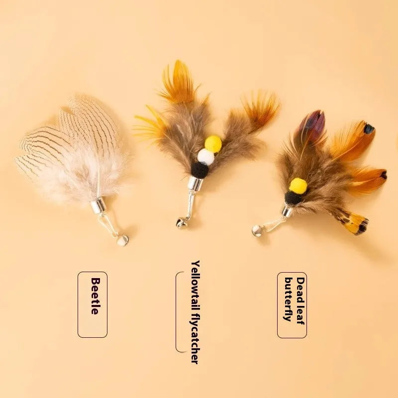Three small flying insect-shaped cat toy heads on steel wire stems, in assorted colours.