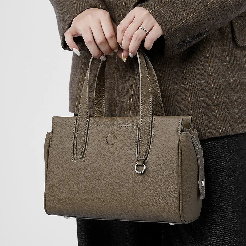 Genuine leather crossbody bag in horizontal square suitcase shape with shoulder strap