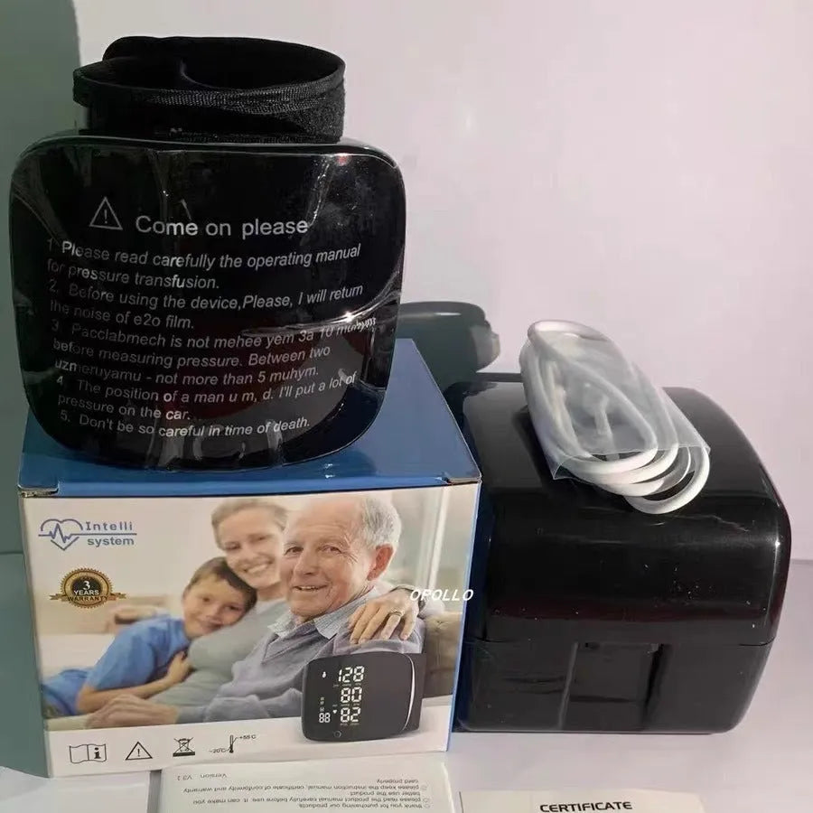 Black wrist blood pressure monitor with USB charging cable and multilingual voice options.
