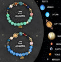Two natural stone beaded bracelets with zodiac signs on an adjustable elastic cord.