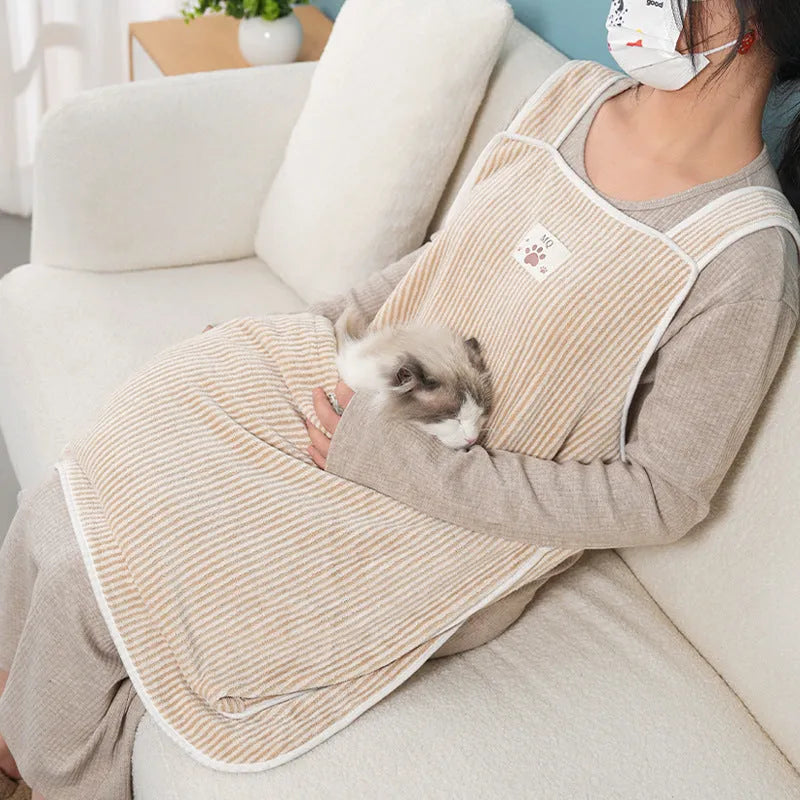 Cat petting apron in multiple colour options including pink, light blue, and striped patterns for grooming protection