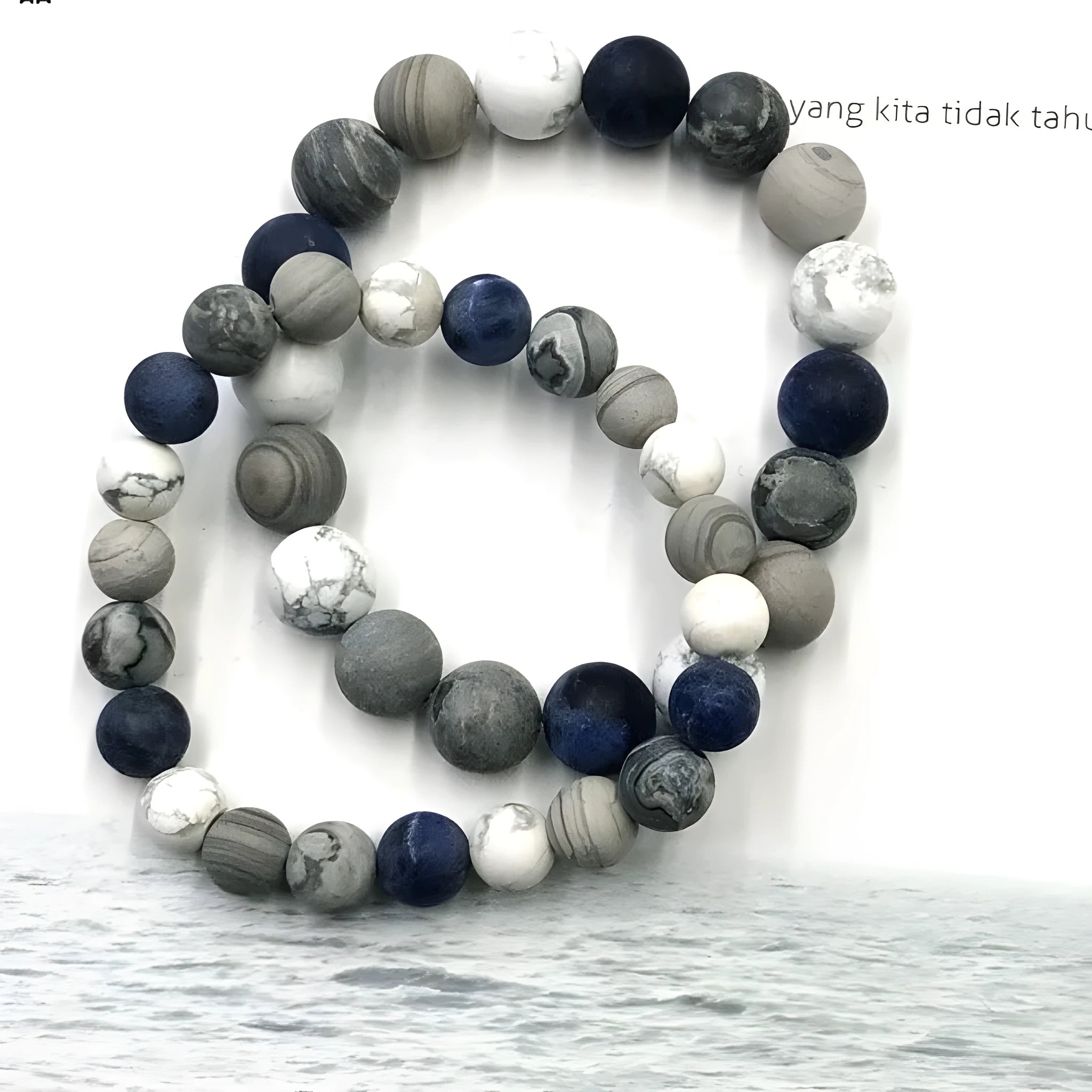 Handmade planet stone men's bracelet with U-shaped adjustable design showing natural stone beads