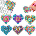 Set of six handmade PU leather cornerite bookmarks with stick-on crystal flower designs.