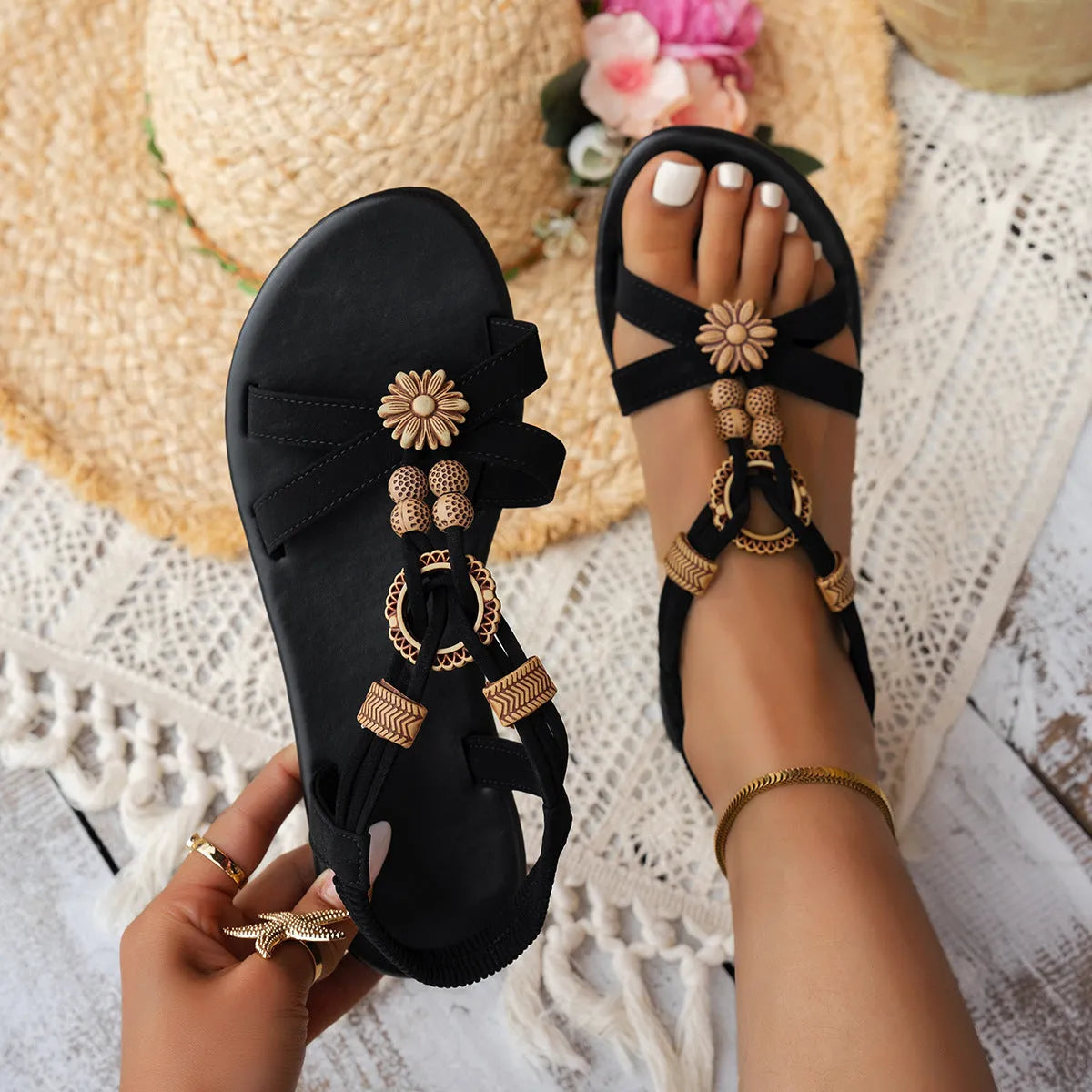 Black ethnic style women's flat beach sandals with beaded weave upper and open toe design