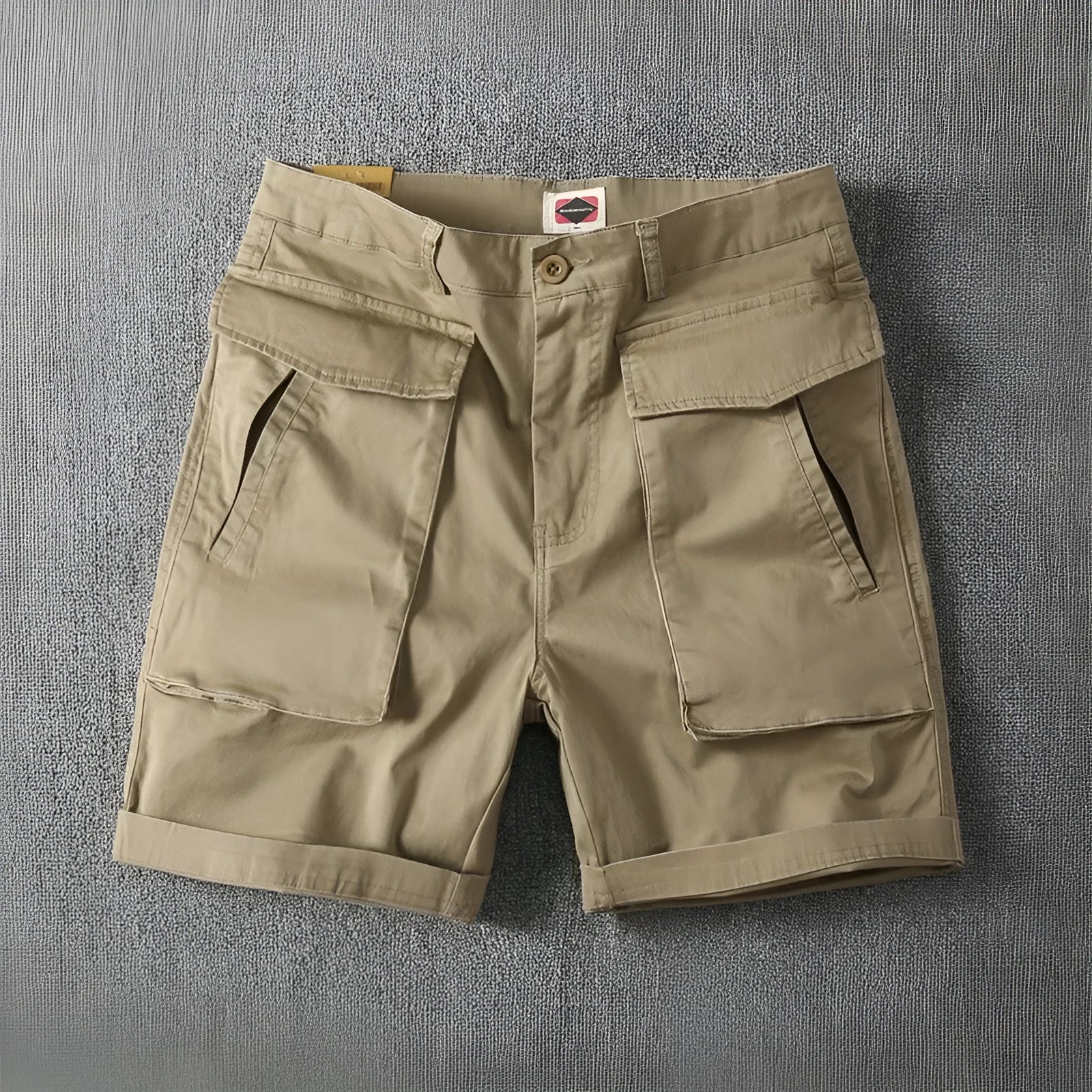 Men's straight-leg cargo shorts in stretch cotton fabric, shown in a neutral colour with multiple pockets.
