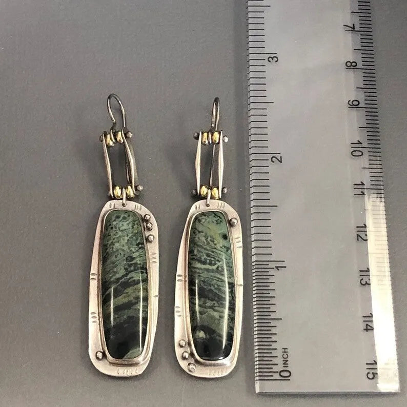 Geometric alloy earrings with two-colour marble pattern on simple drop design