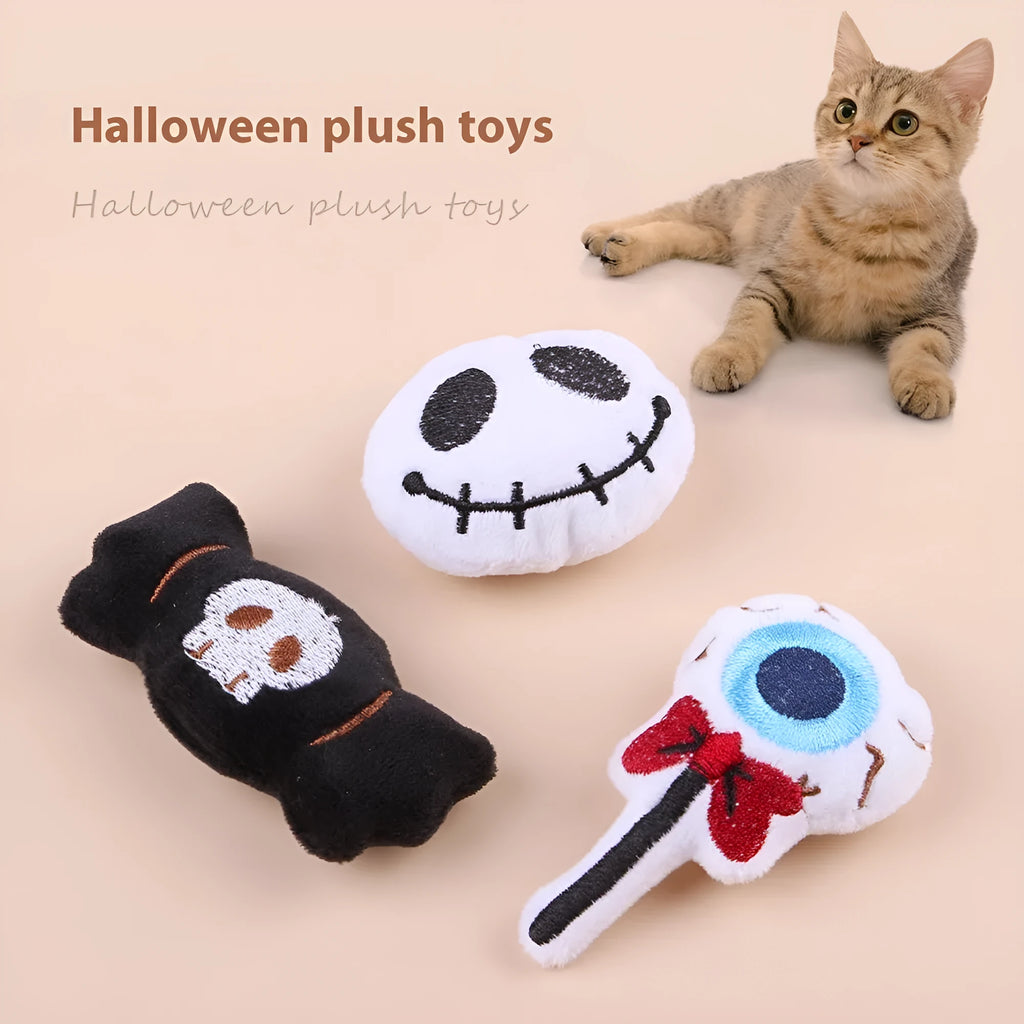 Plush cat teaser toy with feather wand in candy or skull design for small cats