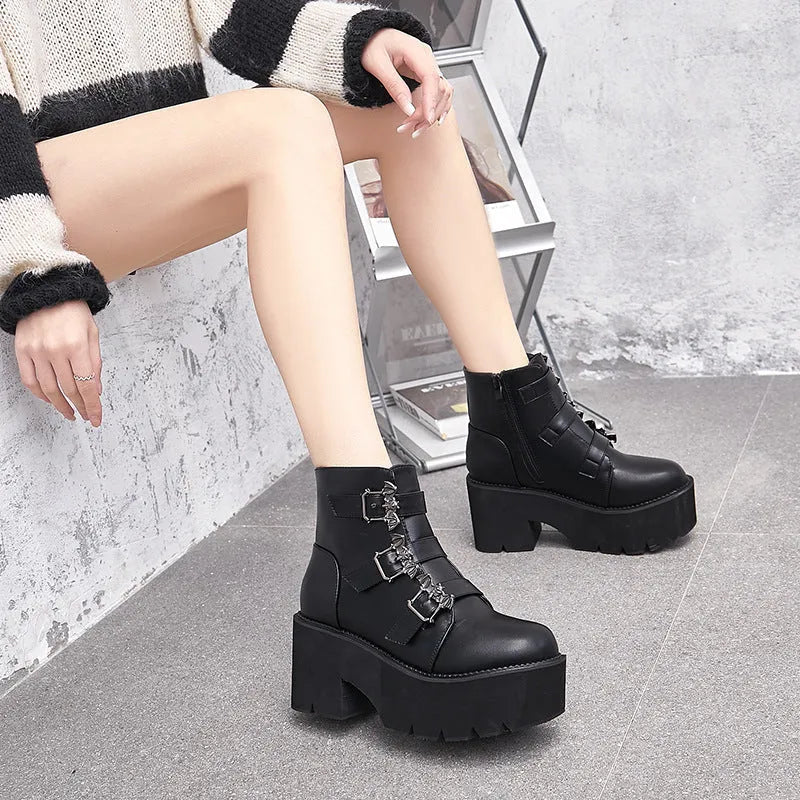 Black women's punk gothic ankle boots with bat buckle, side zipper, and chunky platform heel.