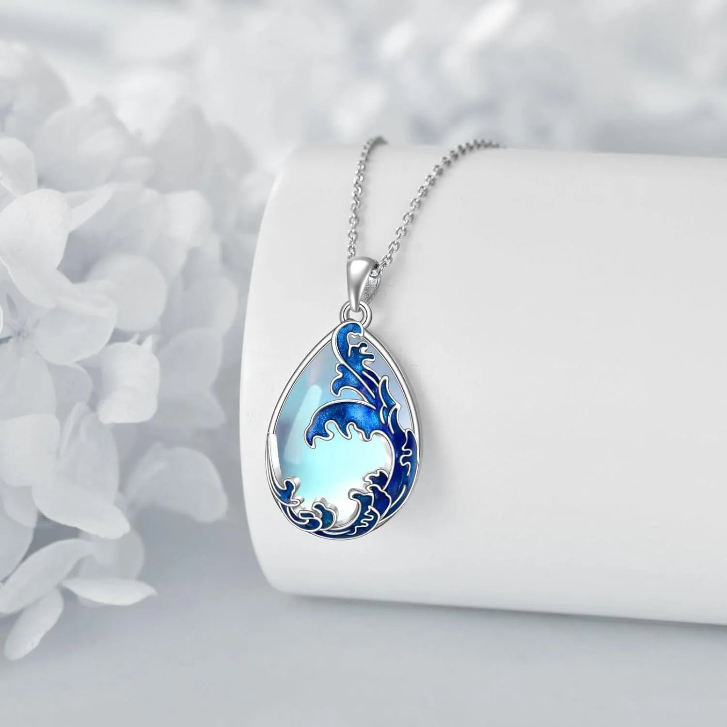 Blue alloy pendant necklace with heart design elements on a metal chain