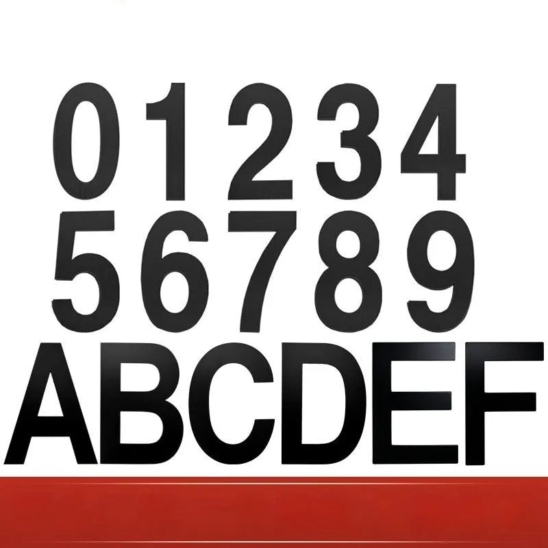 Black stainless steel sticky house numbers and letters, each 7.5cm high, on a white background.