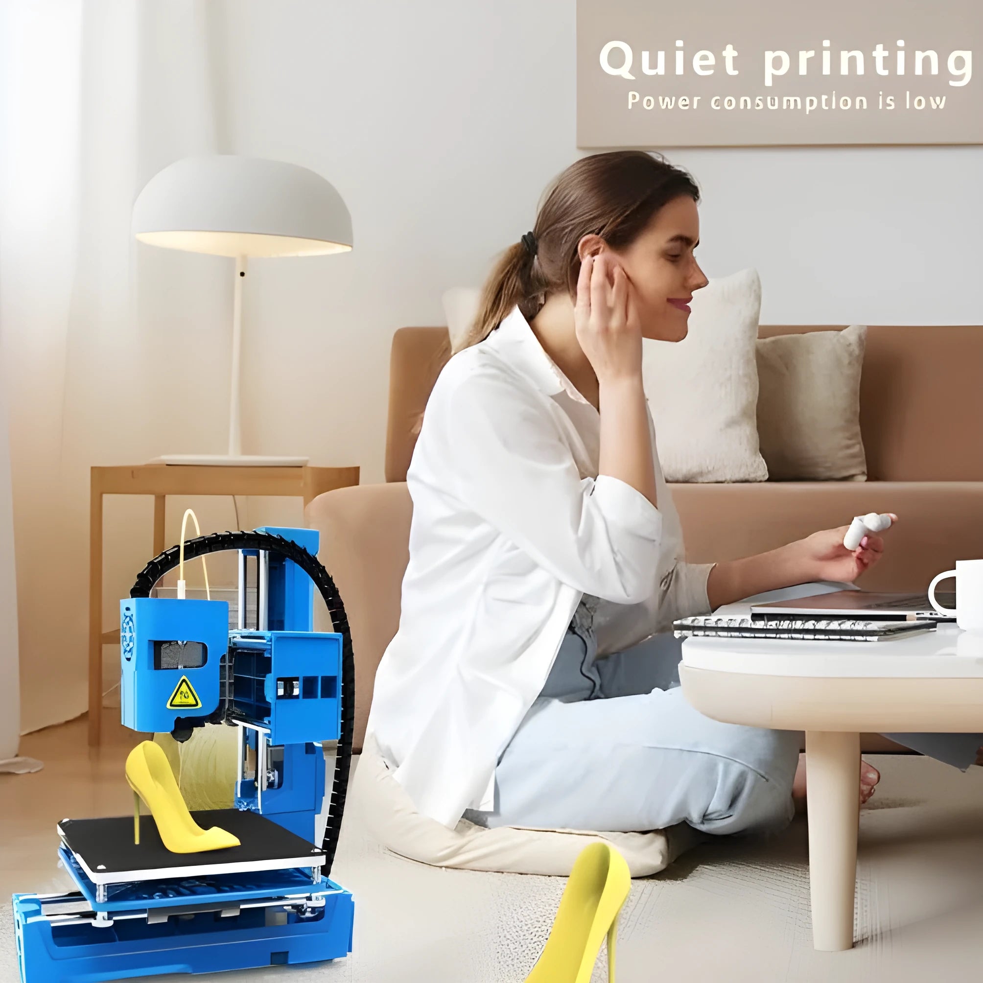 K9 mini desktop 3D printer with compact build chamber, shown in black and blue colour options.