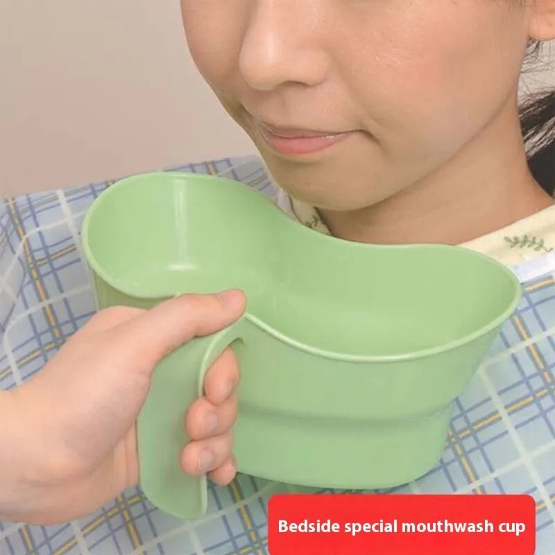 Green plastic bedridden care mug with flexible angled drinking tube