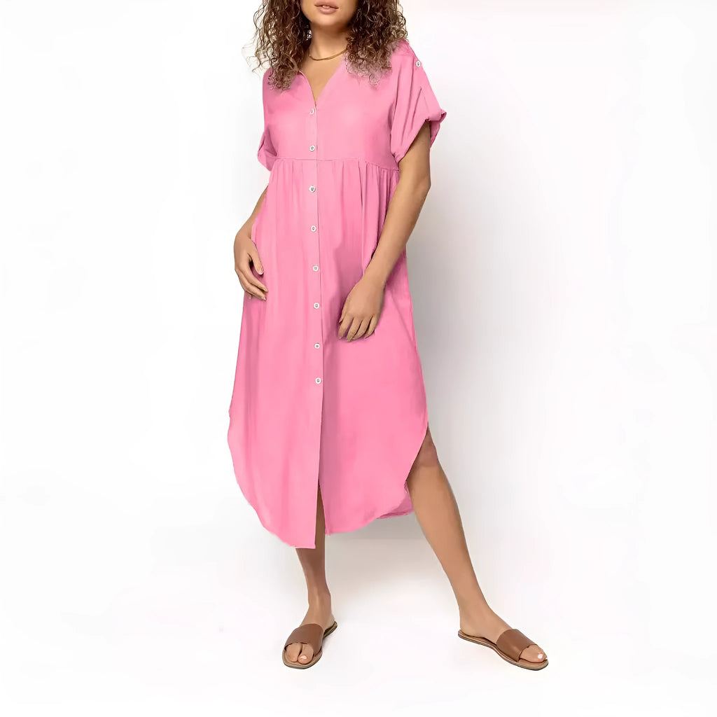 A solid colour mid-length casual dress with a button-down front and regular sleeves on a hanger.