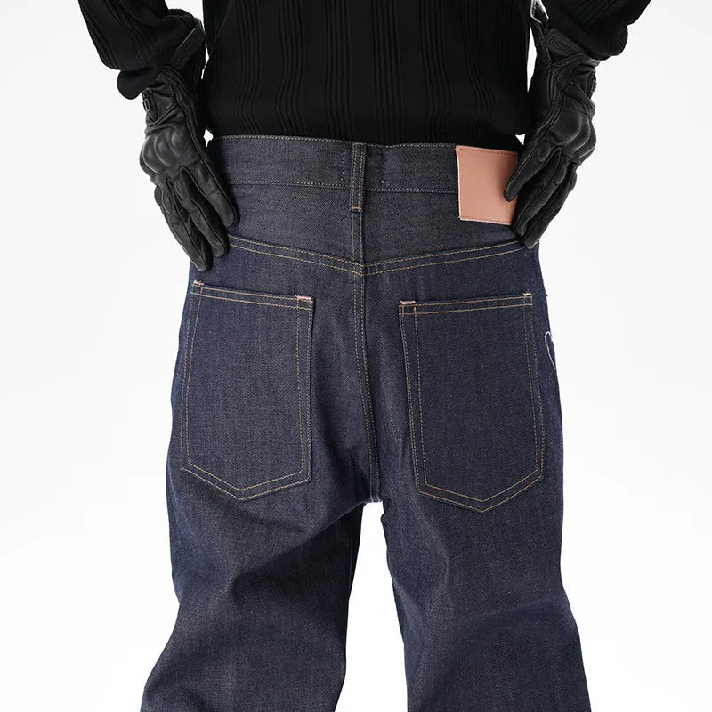A pair of dark blue casual loose straight-cut jeans on a plain background.