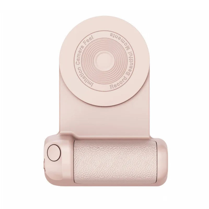 Black magnetic phone camera grip holder with rotatable bracket on a table.