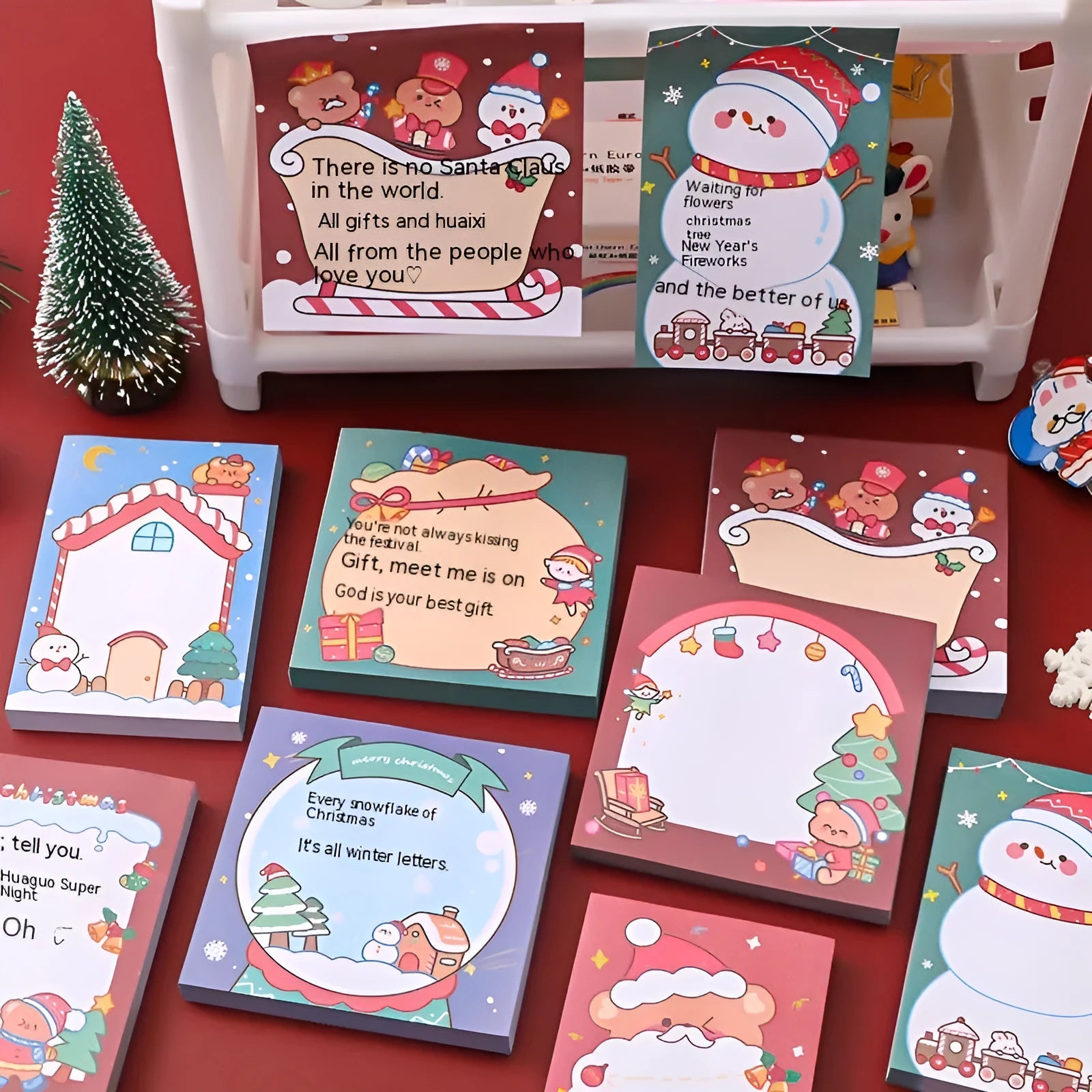 Christmas cartoon sticky notes set showing elf, gift, sled, crystal ball, Santa, house, bear, and snowman designs