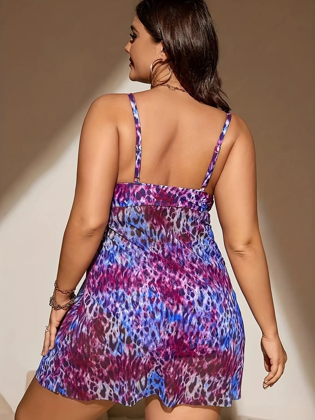 Plus size women's skirt split bikini swimsuit set in blue polyester fabric.