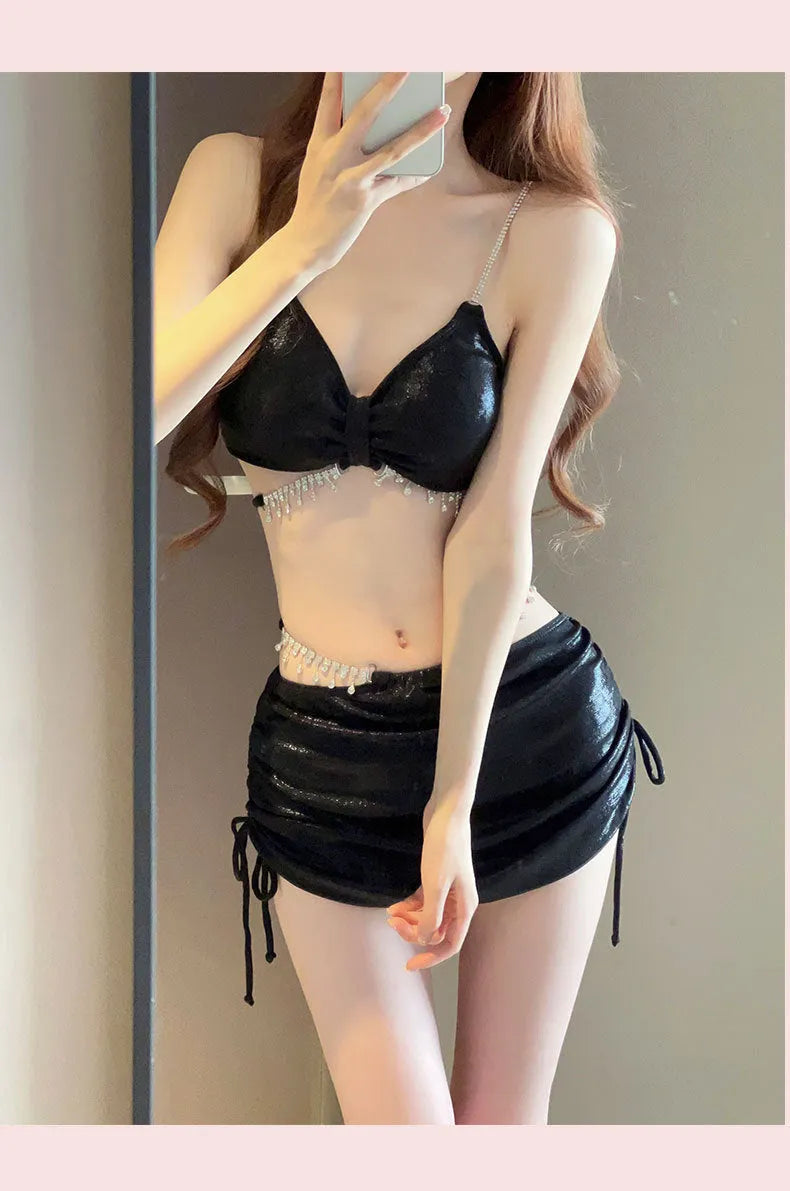 Women's black or pink solid colour polyester bikini swimsuit set for swimming.