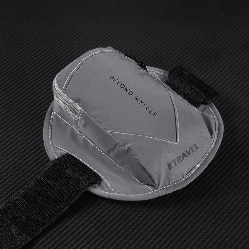 Black reflective running arm band with adjustable strap for a smartphone.