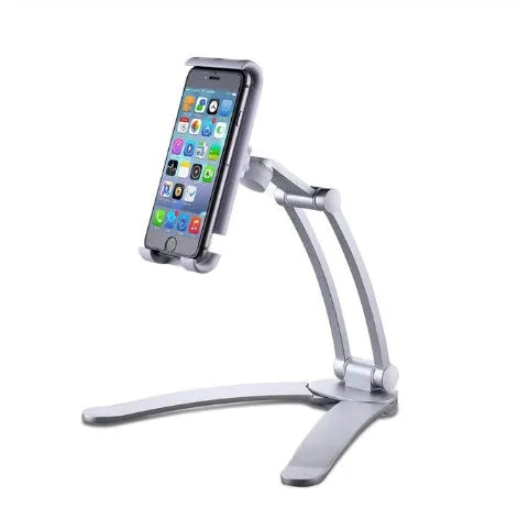 Silver aluminium alloy desktop tablet stand holding a tablet, showing 360-degree adjustable arm and mounting base.