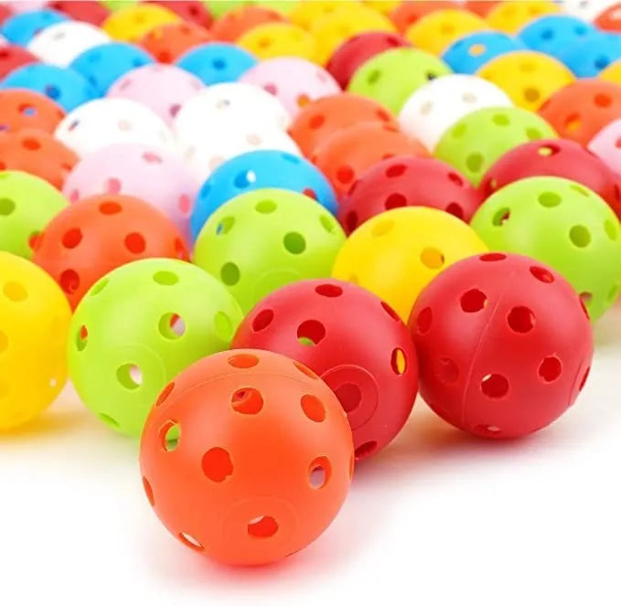 Multi-colour 26-hole golf practice balls in red, orange, blue, green, white, and yellow, displayed in a net bag.