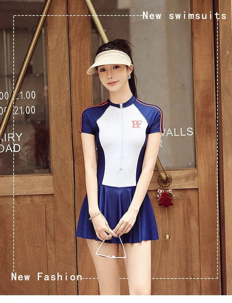 Ladies conservative style one-piece swimsuit in elastic polyester for sports.