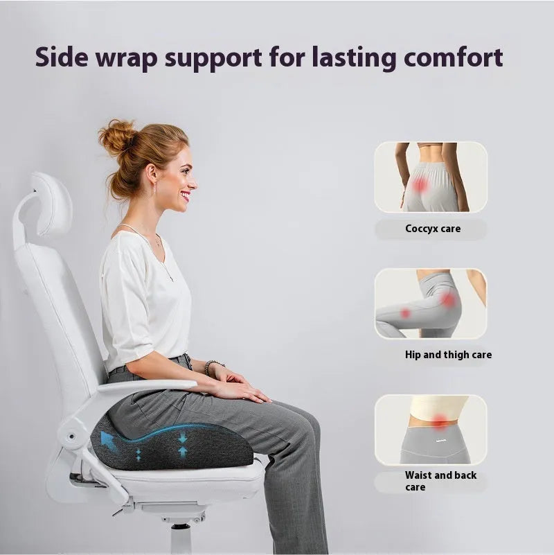 Light grey memory foam office chair cushion on a black desk chair.