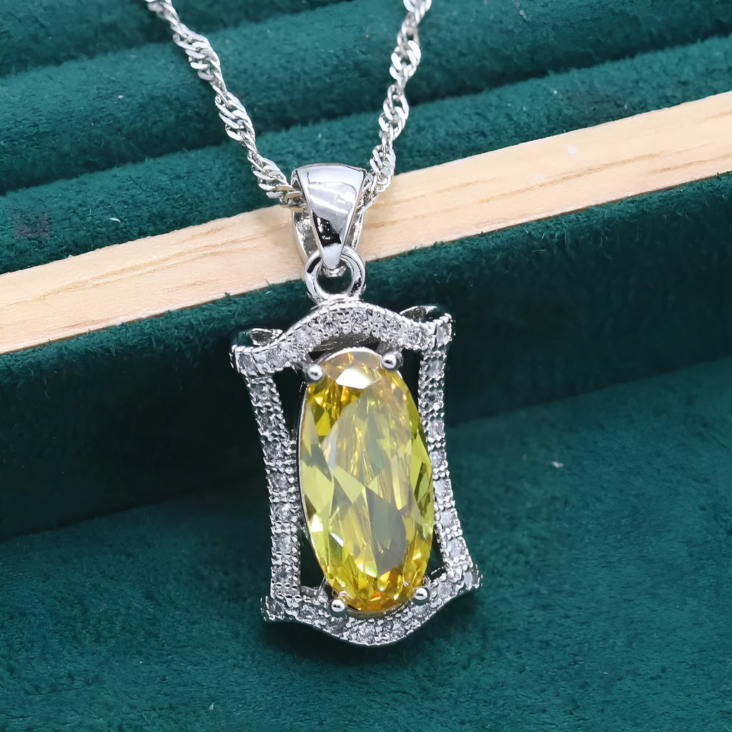 Zircon jewellery set with necklace, earrings, ring, and bracelet in yellow or olive green colours
