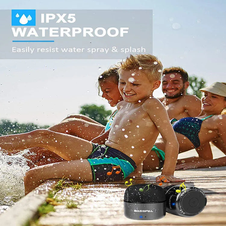 Black waterproof portable Bluetooth speaker showing button controls and compact design