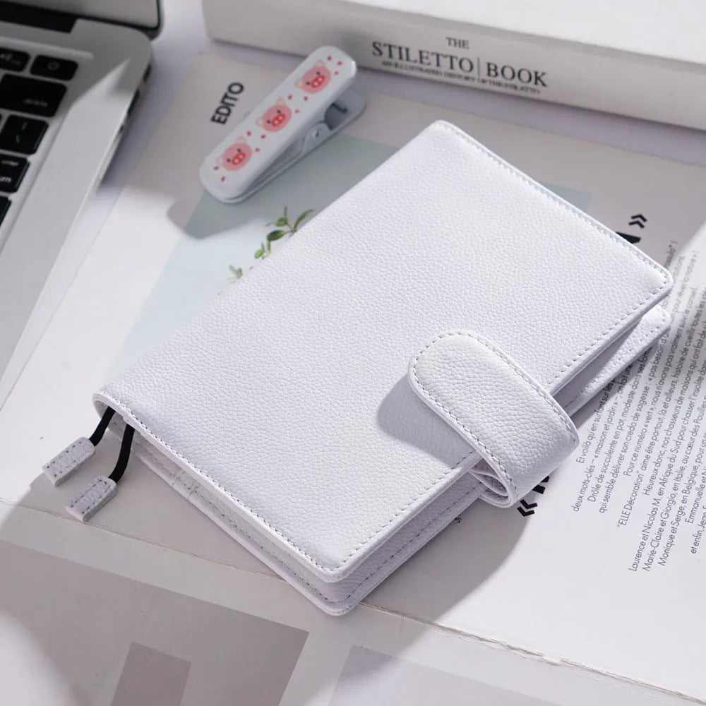 A6 size leather loose-leaf diary with a textured lychee pattern cowhide cover