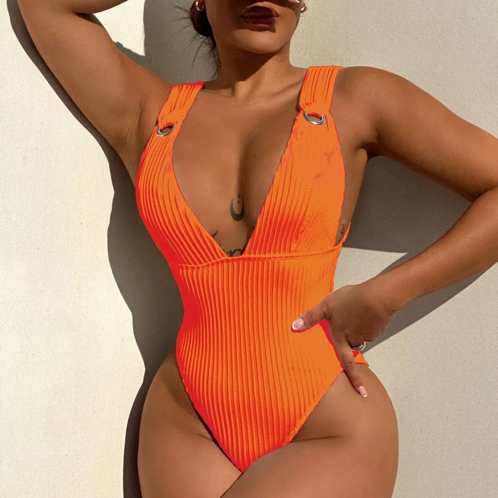 A solid colour one-piece swimsuit for women with a v-neck and adjustable side ties, shown in black.