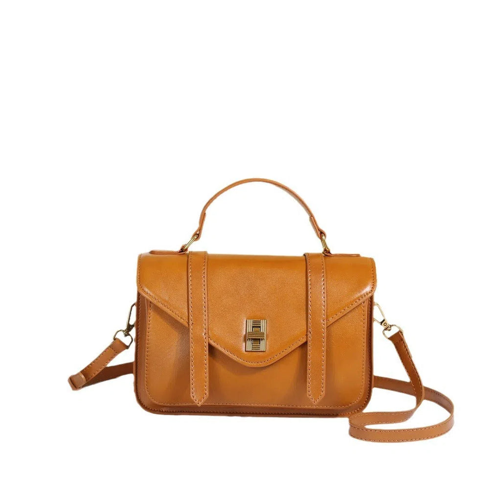 Full-grain vegetable-tanned cowhide tote bag in horizontal rectangular shape with double shoulder straps, large capacity interior, available in five colours