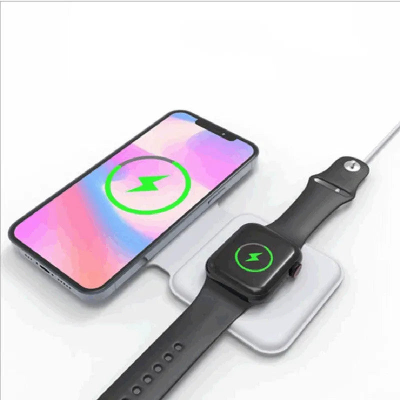 White folding dual magnetic wireless charging dock shown in stand mode with a phone attached.