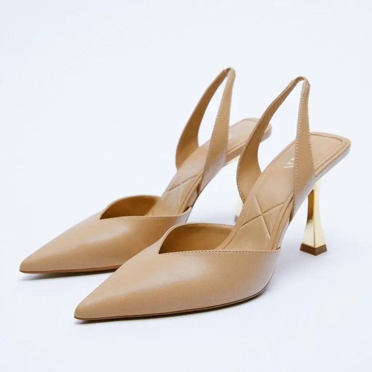 Apricot and black patent leather pointed toe high heels for women with a shallow mouth design.