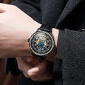Men's waterproof mechanical watch with stainless steel strap and round dial showing visible movement through transparent case back