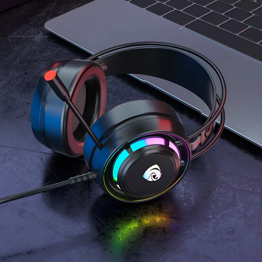 Black wired over-ear computer headphones with a microphone and long cable.