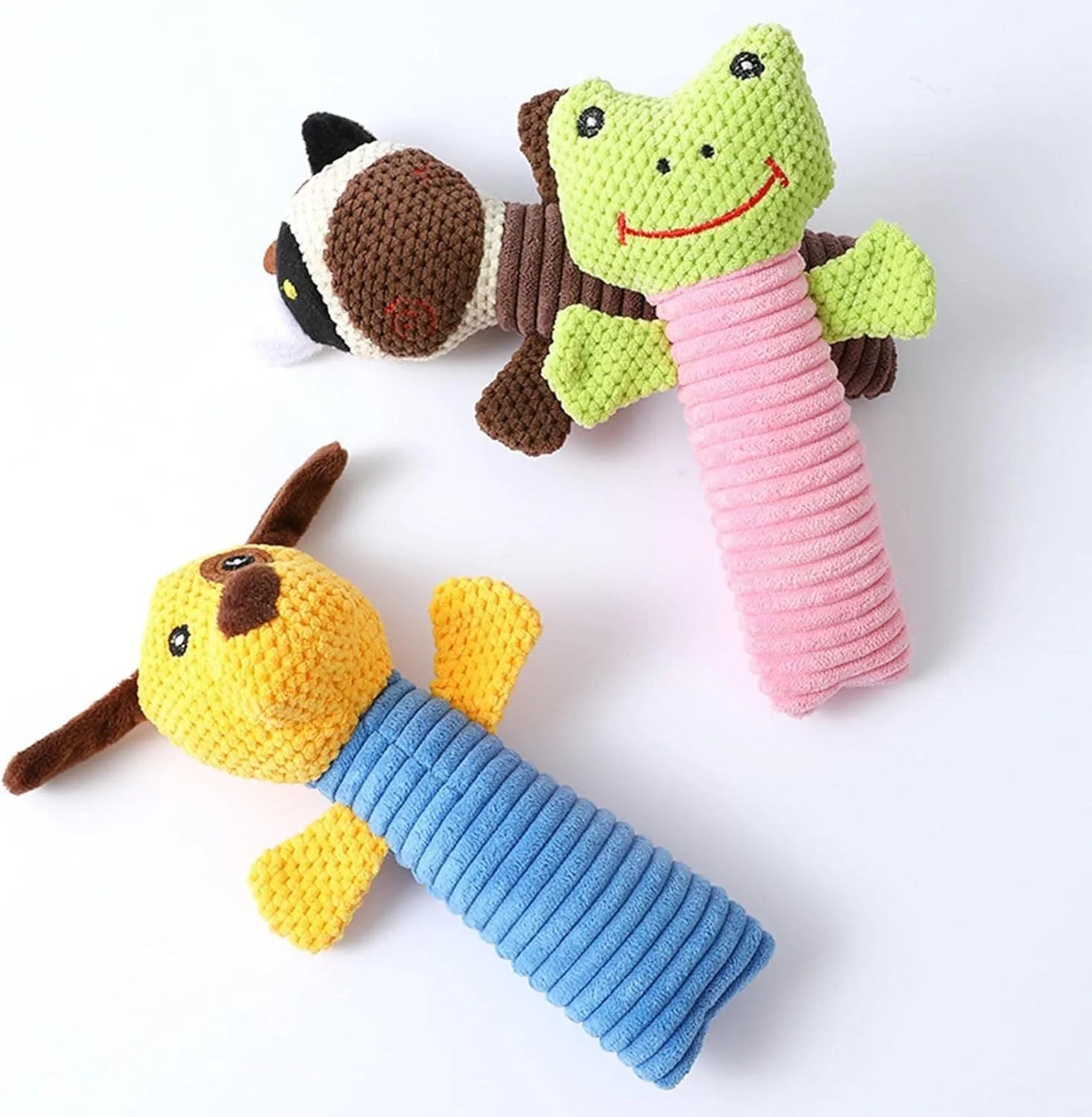 Squeaky stuffed animal dog chew toy for dental cleaning and play.