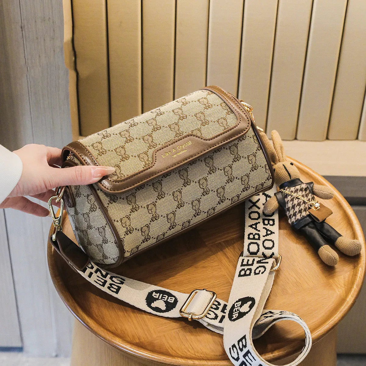 Khaki canvas square shoulder bag with cute bear design, woven letter and stitching details, 21x13x10cm